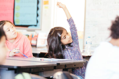 Girl raising her hand